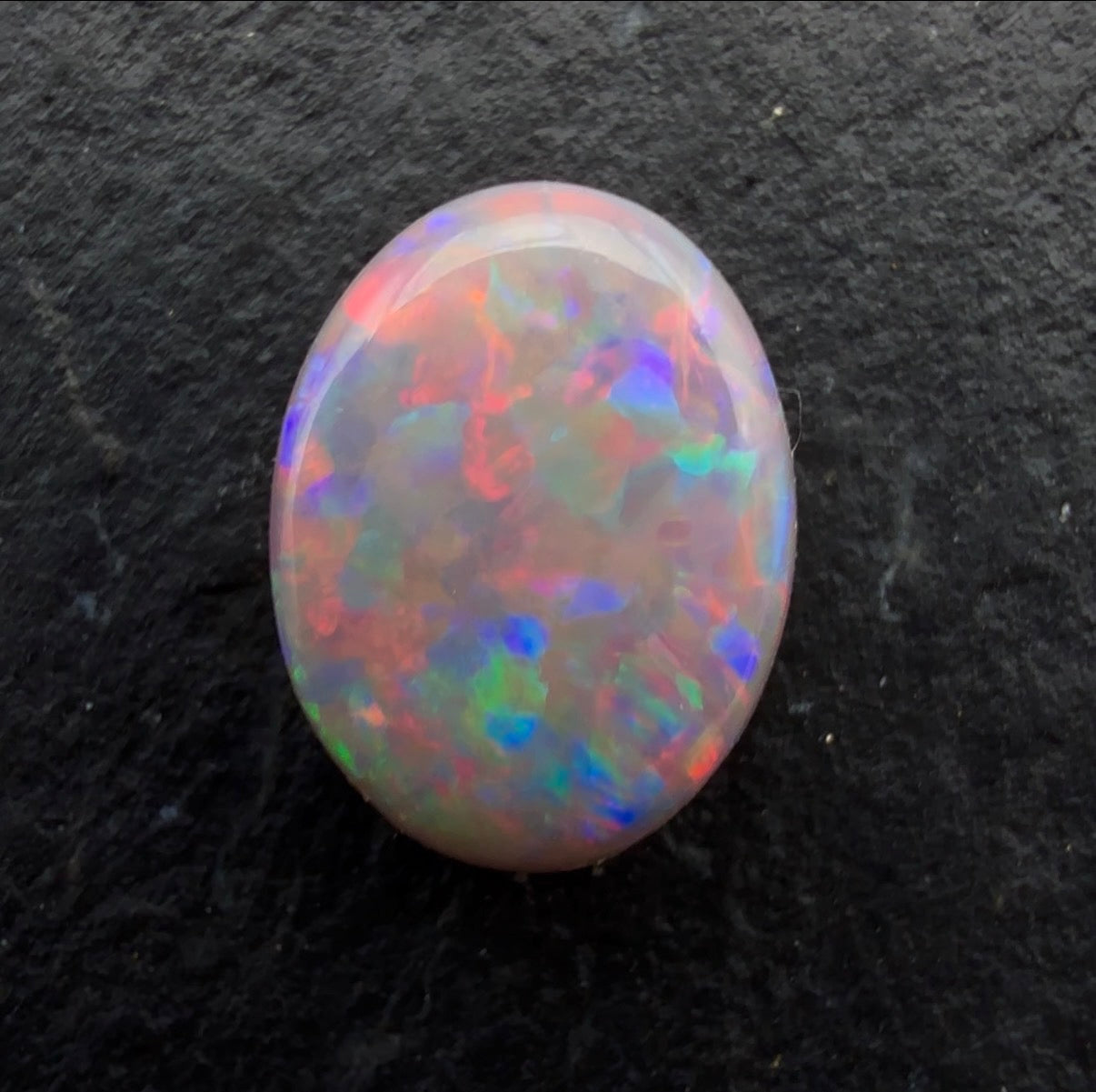 0.92cts Affordable Gem Dark Opal With A Red Pink Multicolor Pattern