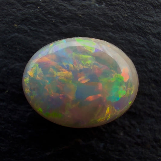 0.94cts Gem Dark Opal With A Beautiful Red Pink Multicolor Pattern