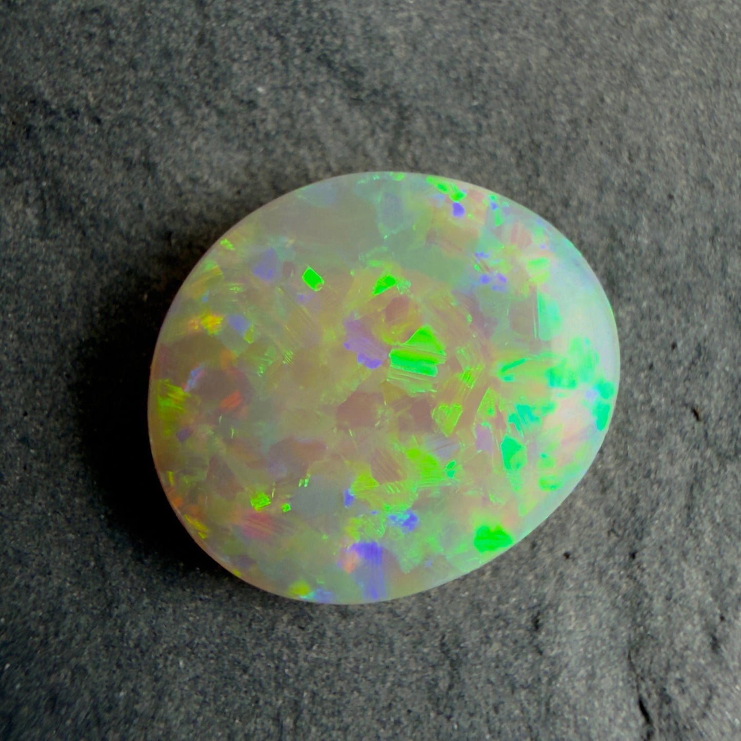 1.5cts Affordable Crystal Opal With A Beautiful Green Yellow Gold Pattern