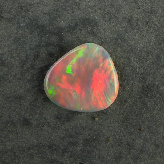 0.49cts Affordable Gem Dark Opal With A Beautiful Mixed Red Pink Multicolor Pattern