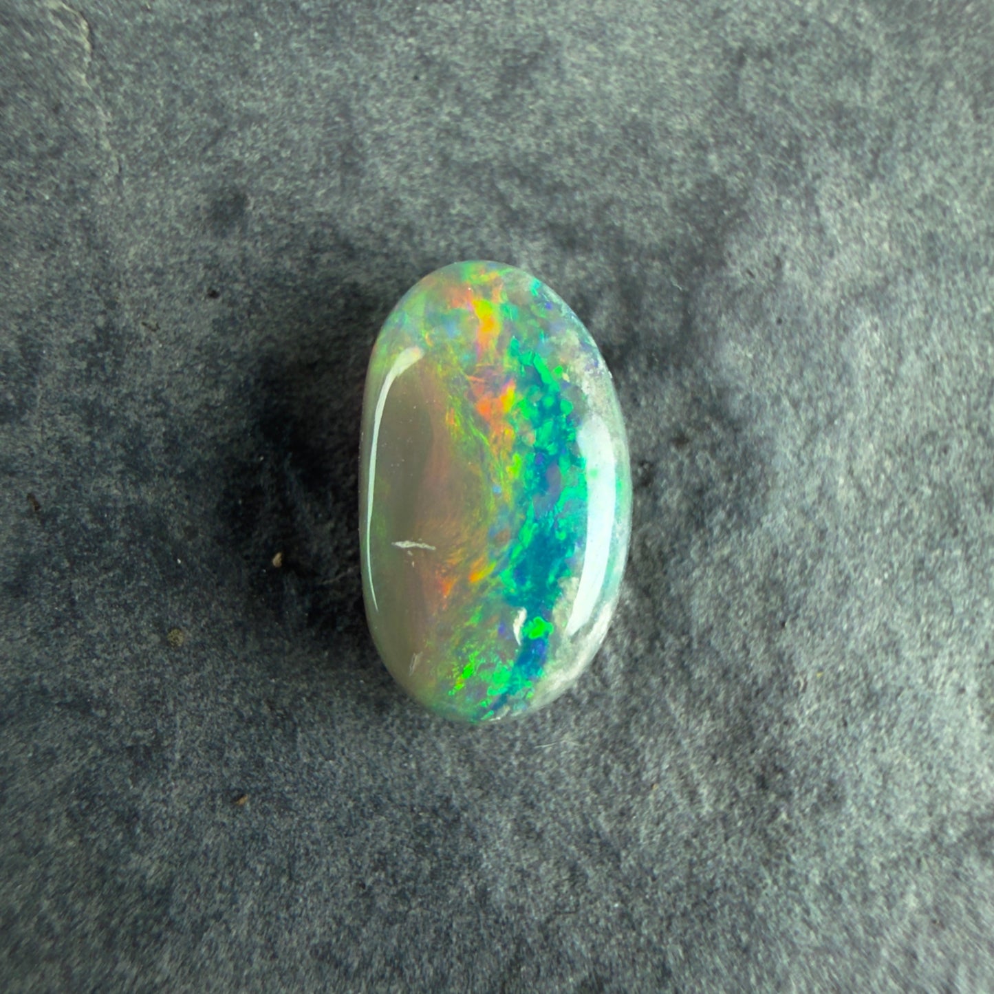 0.84cts Affordable Dark Opal With A Beautiful Mixed Green Yellow Gold Pattern