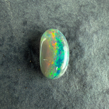 0.84cts Affordable Dark Opal With A Beautiful Mixed Green Yellow Gold Pattern