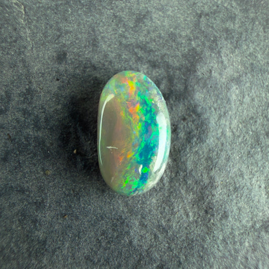 0.84cts Affordable Dark Opal With A Beautiful Mixed Green Yellow Gold Pattern