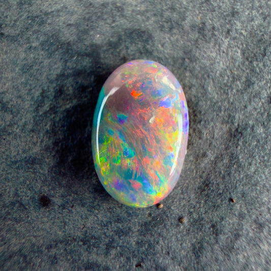 0.75cts Gem Dark Opal With A Beautiful Mixed Red Pink Multicolor Pattern