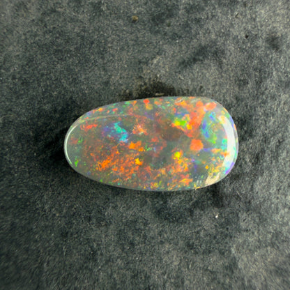 0.56cts Gem Crystal Opal With A Beautiful Mixed Red Pink Multicolor Pattern