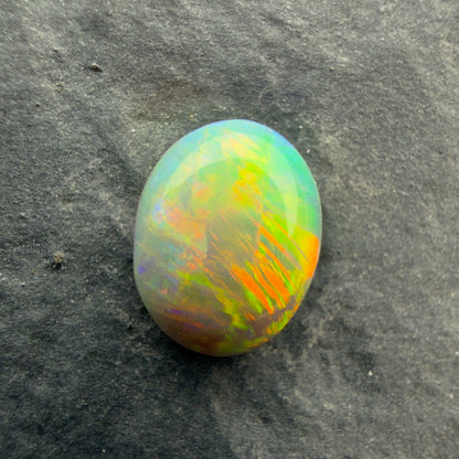 0.71cts Gem Crystal Opal With Green Yellow Gold Pattern