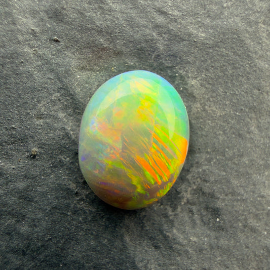 0.71cts Gem Crystal Opal With Green Yellow Gold Pattern