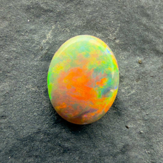 0.69cts Gem Dark Opal With Red Pink Multicolor Pattern