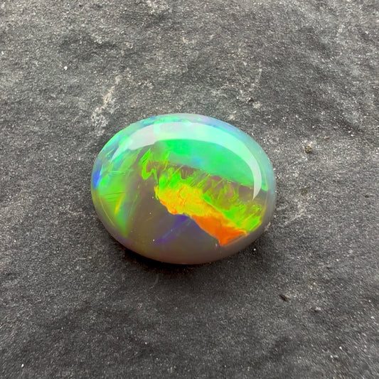 0.83cts Gem Dark Opal With Red Pink Multicolor Pattern