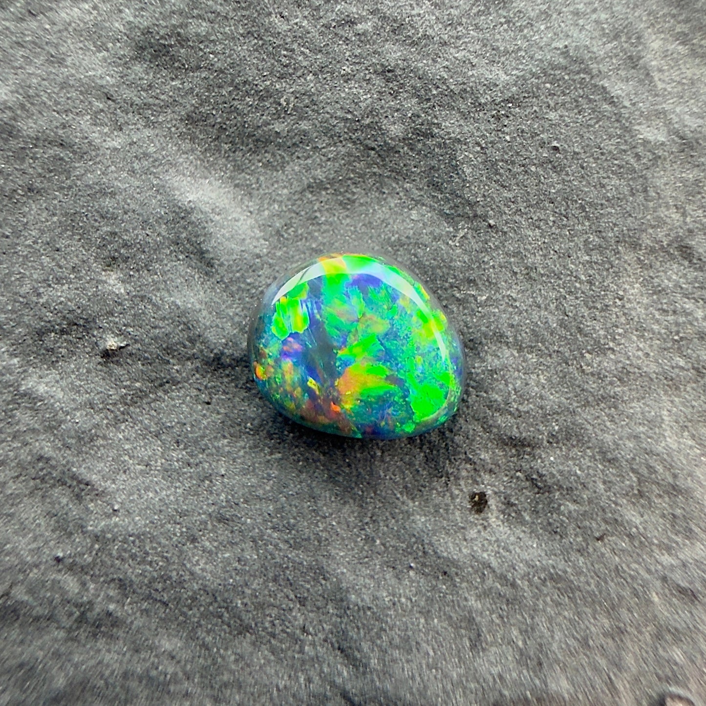 0.26cts Top Gem Micro Black Opal With A Green Yellow Gold Pattern
