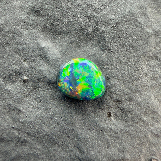0.26cts Top Gem Micro Black Opal With A Green Yellow Gold Pattern