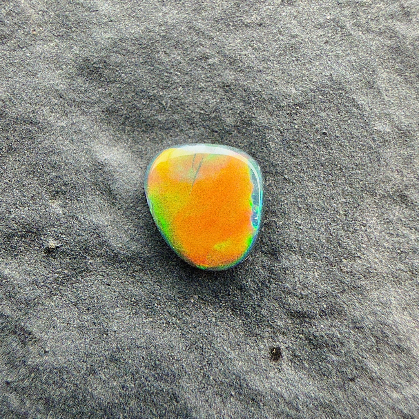 0.26cts Top Gem Micro Black Opal With A Green Yellow Gold Pattern