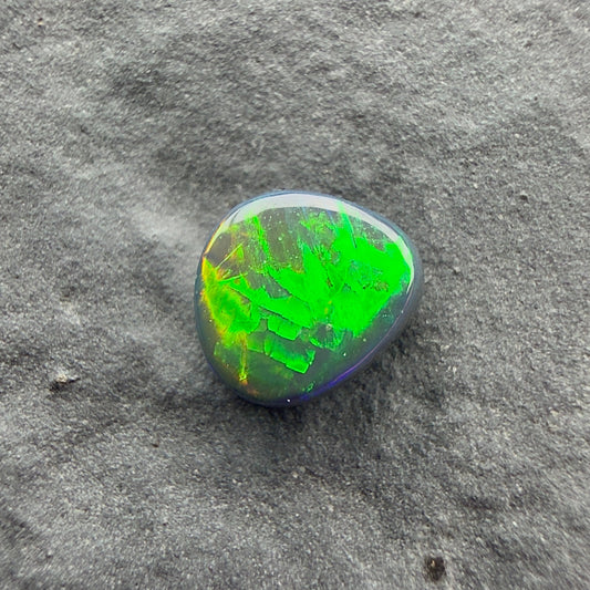 0.37cts Top Gem Micro Black Opal With A Green Yellow Gold Pattern