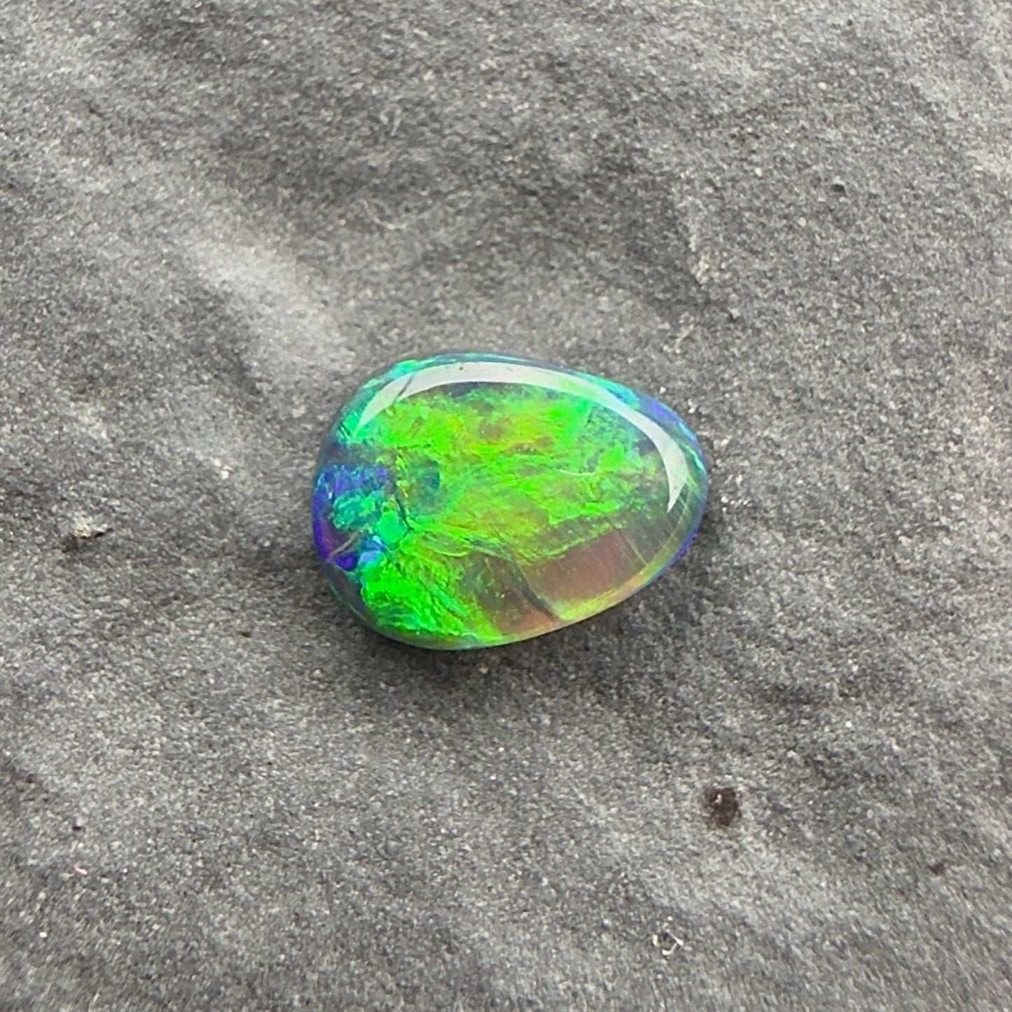 0.24cts Top Gem Micro Black Opal With A Green, Gold Broadflash Pattern Pattern
