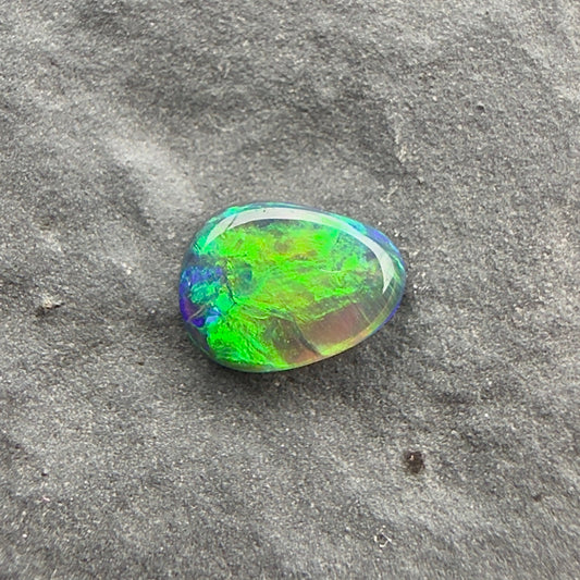 0.24cts Top Gem Micro Black Opal With A Green, Gold Broadflash Pattern Pattern