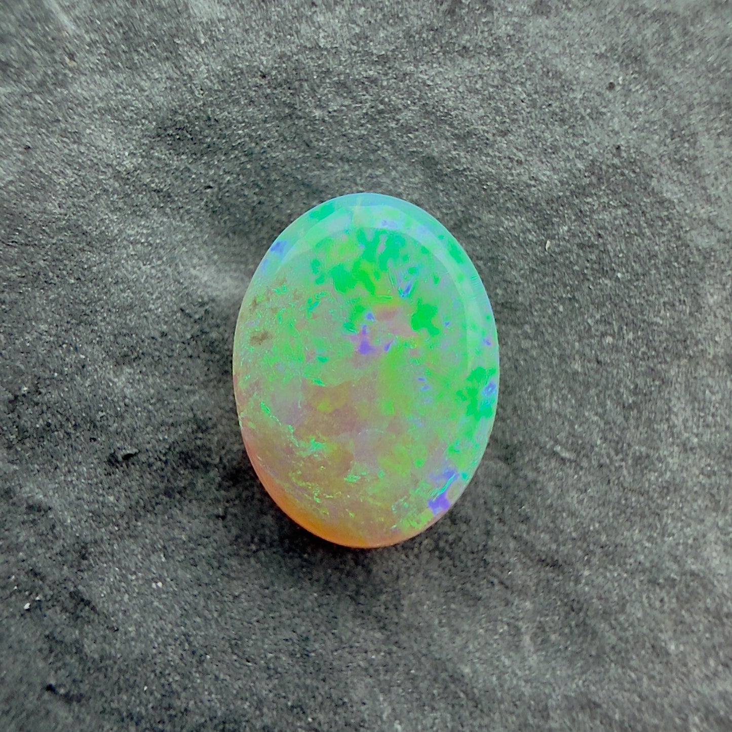 0.62cts Affordable Gem Crystal Opal With A Green Blue Pattern