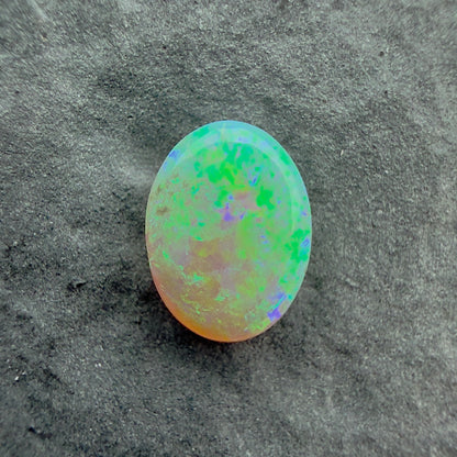 0.62cts Affordable Gem Crystal Opal With A Green Blue Pattern