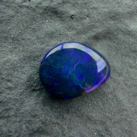 0.8cts Affordable Black Opal With A Deep Blue Pattern
