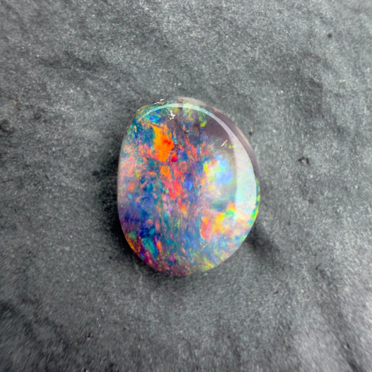 0.55cts Affordable Dark Opal With A Vivid Red Pink Multicolor Play Of Color
