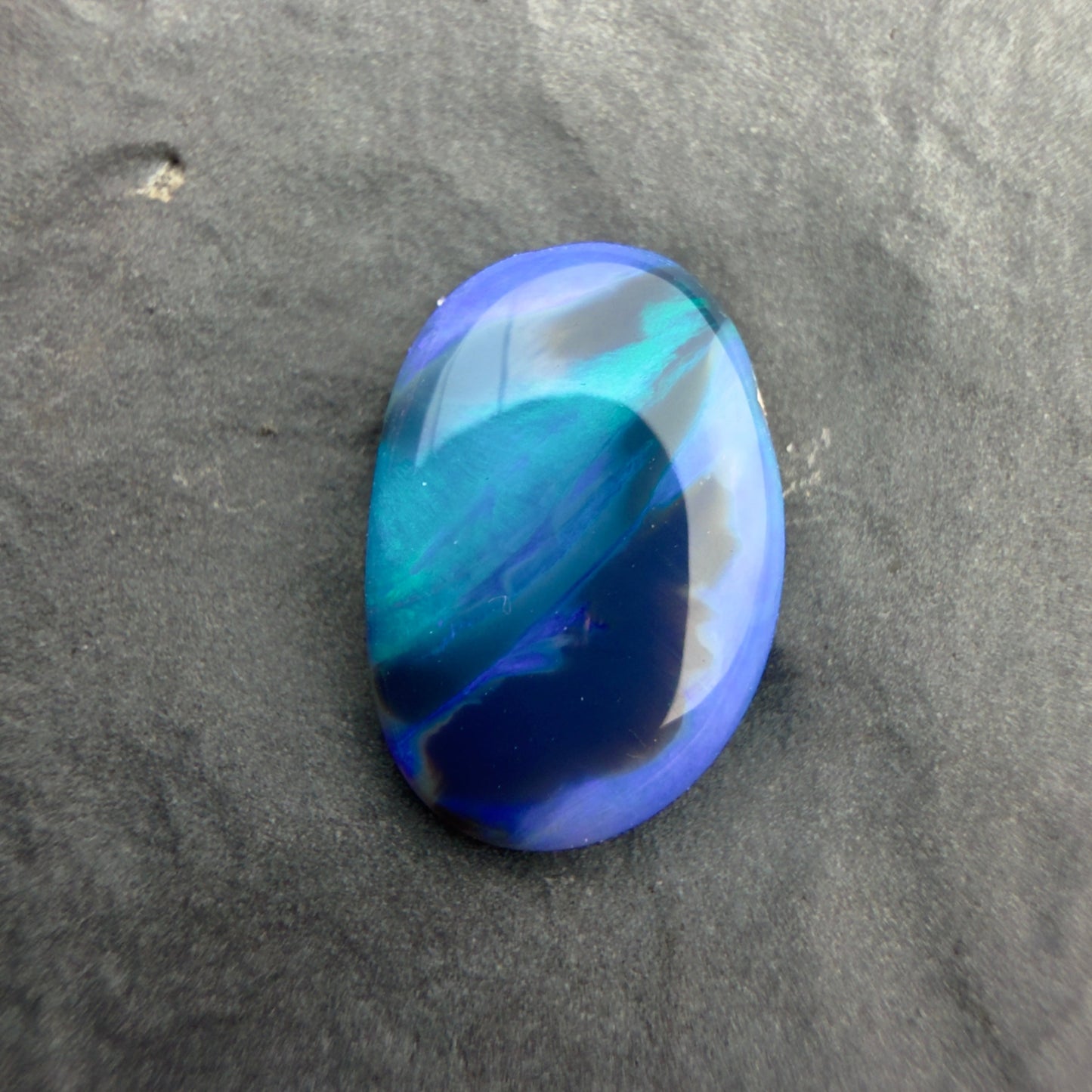 1.29cts Affordable Dark Opal With A Green Blue Color Palette