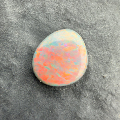 0.66cts Affordable Dark Opal With A Red Pink Multicolor Play of color