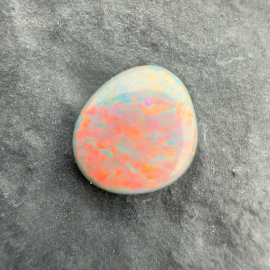 0.66cts Affordable Dark Opal With A Red Pink Multicolor Play of color