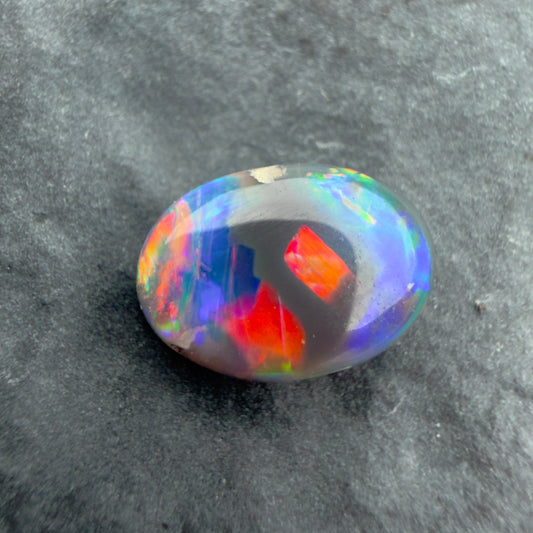 0.71cts Affordable Black Opal With A Red Pink Multicolor Palette