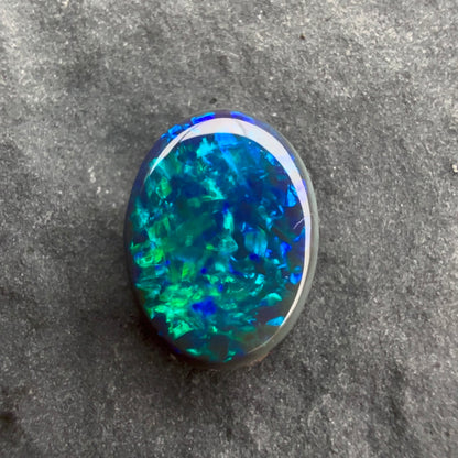 0.68cts Affordable Black Opal With A Green Blue Play Of Color, From Lightning Ridge Australia