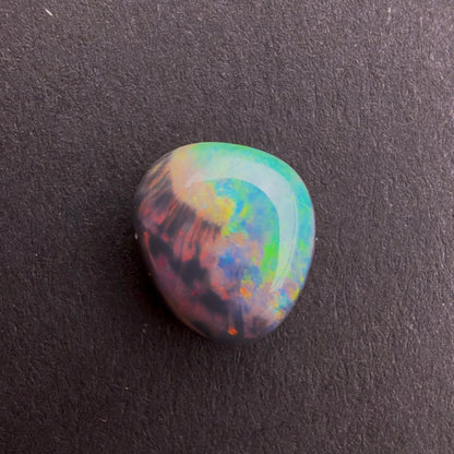 Black Opal Picture Stone With A Red Pink Multicolor Play Of Color, From Lightning Ridge Australia