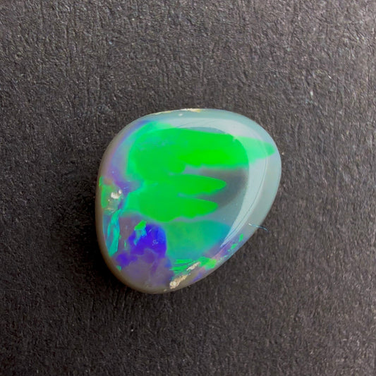 0.89cts Black Opal With A Green Blue Play Of Color, From Lightning Ridge Australia