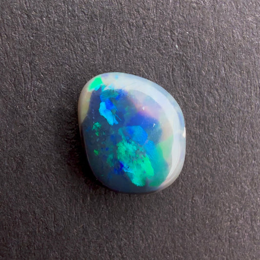 0.53cts Black Opal With A Green Blue Play Of Color, From Lightning Ridge Australia