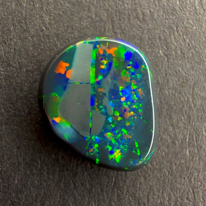 0.69cts Black Opal With A Red Pink Multicolor Play Of Color, From Lightning Ridge Australia (Copy)
