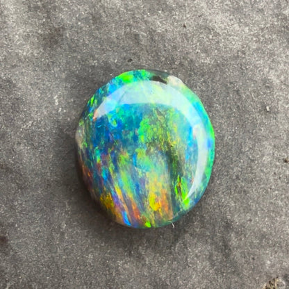 0.83cts Black Opal With A Red Blue Multicolor Play Of Color, From Lightning Ridge Australia