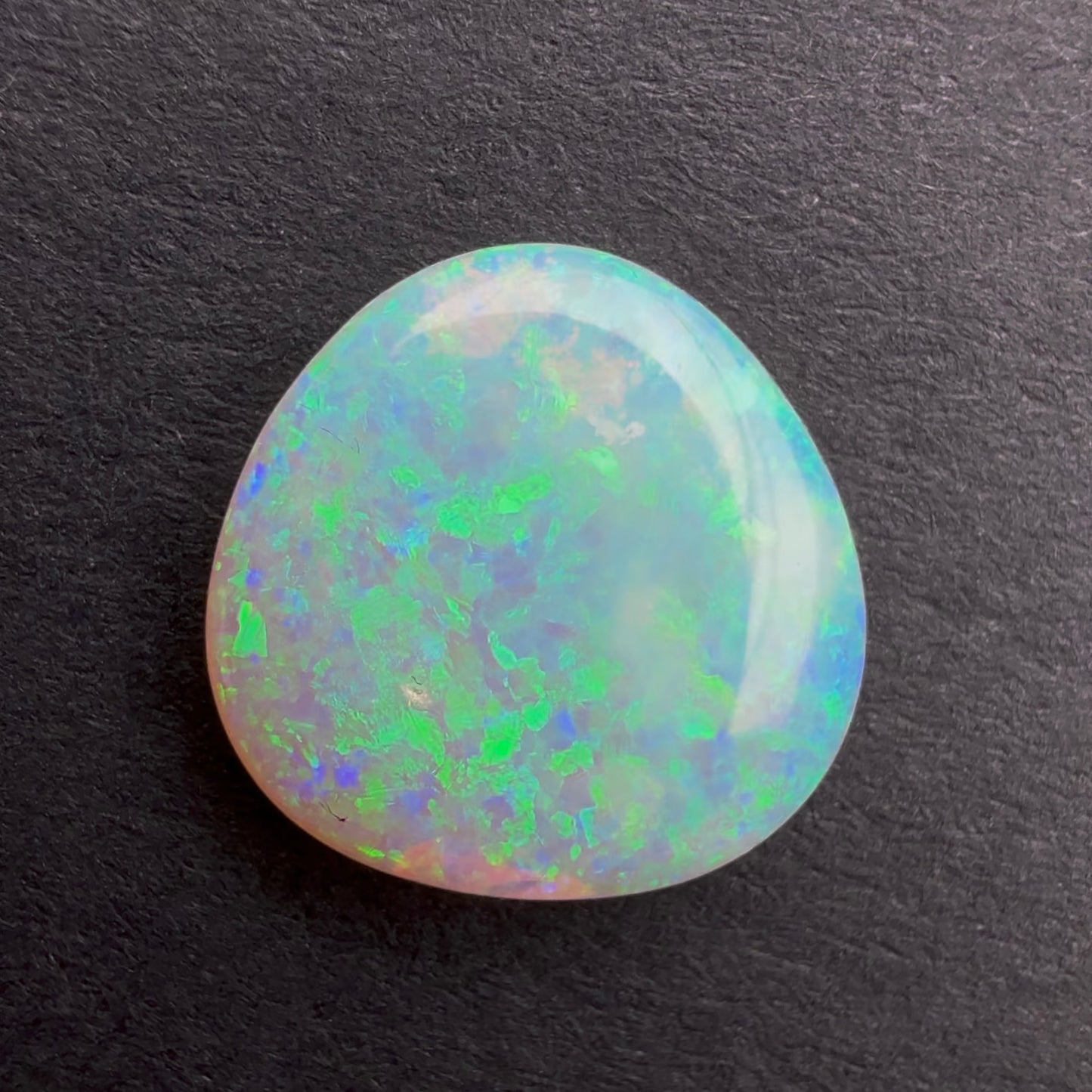 2cts Crystal Opal With A Green Blue Play Of Color, From Lightning Ridge Australia