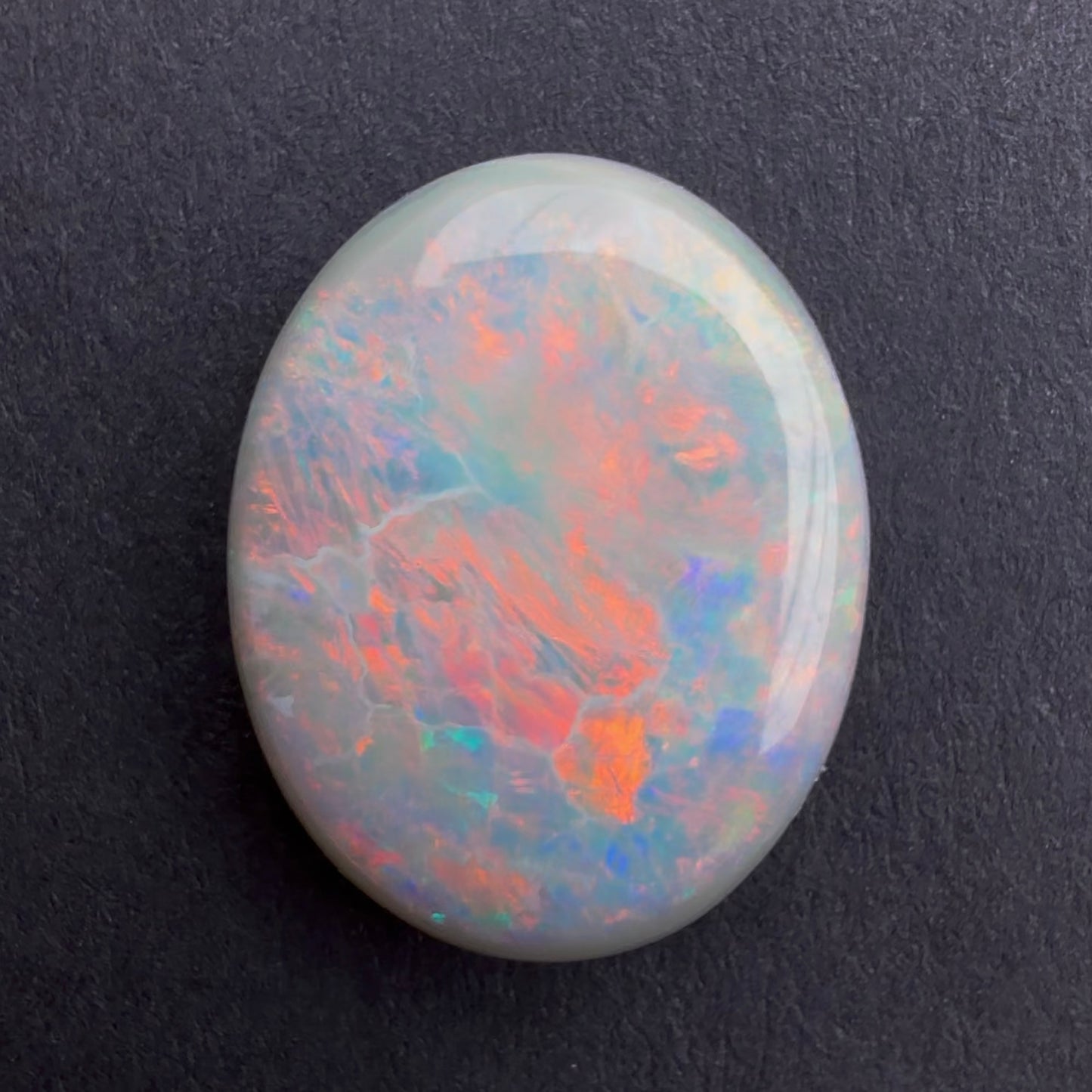 5.39cts Dark Opal With A Red Pink Multicolor Play Of Color, From Lightning Ridge Australia