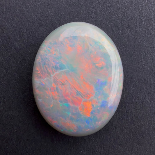 5.39cts Dark Opal With A Red Pink Multicolor Play Of Color, From Lightning Ridge Australia