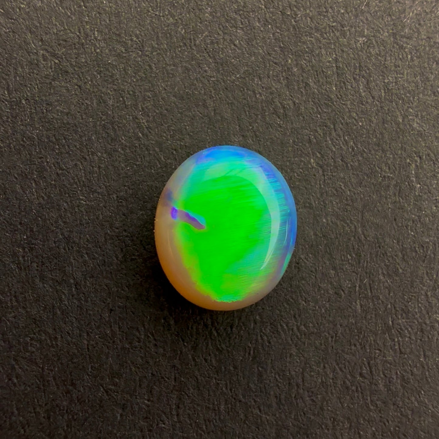 0.69cts Top Gem Crystal Opal With A Green Blue Play Of Color, From Lightning Ridge Australia