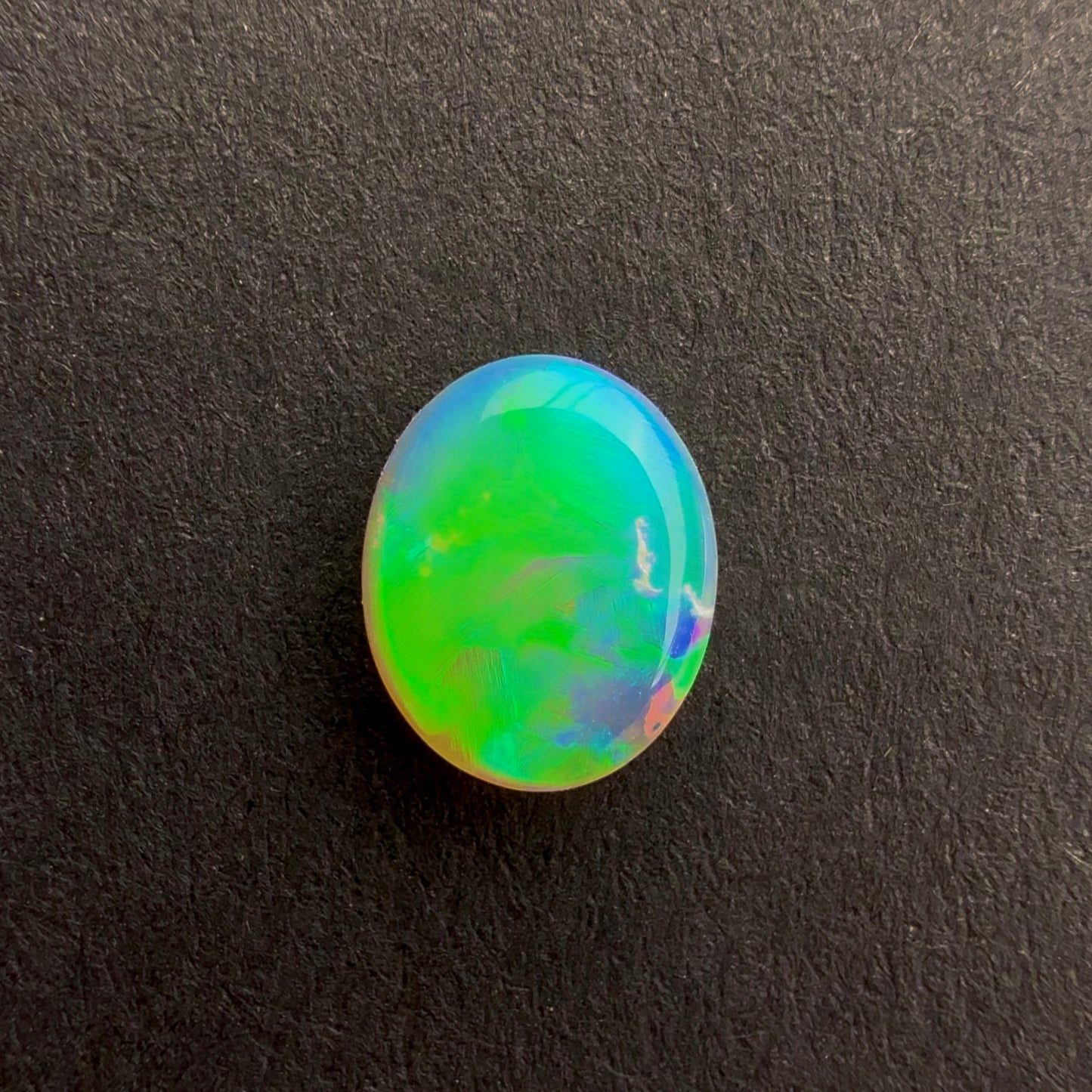 0.5cts Top Gem Crystal Opal With A Green Blue Play Of Color, From Lightning Ridge Australia