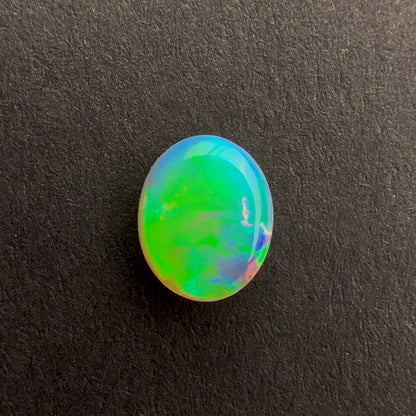 0.5cts Top Gem Crystal Opal With A Green Blue Play Of Color, From Lightning Ridge Australia