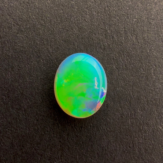 0.5cts Top Gem Crystal Opal With A Green Blue Play Of Color, From Lightning Ridge Australia