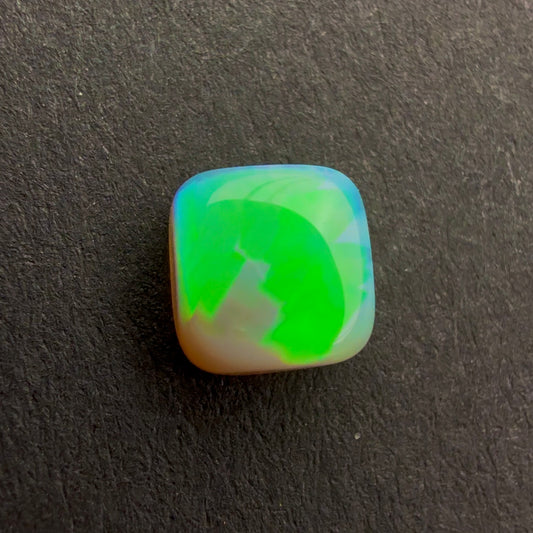 0.6cts Top Gem Dark Crystal Opal With A Green Blue Play Of Color, From Lightning Ridge Australia