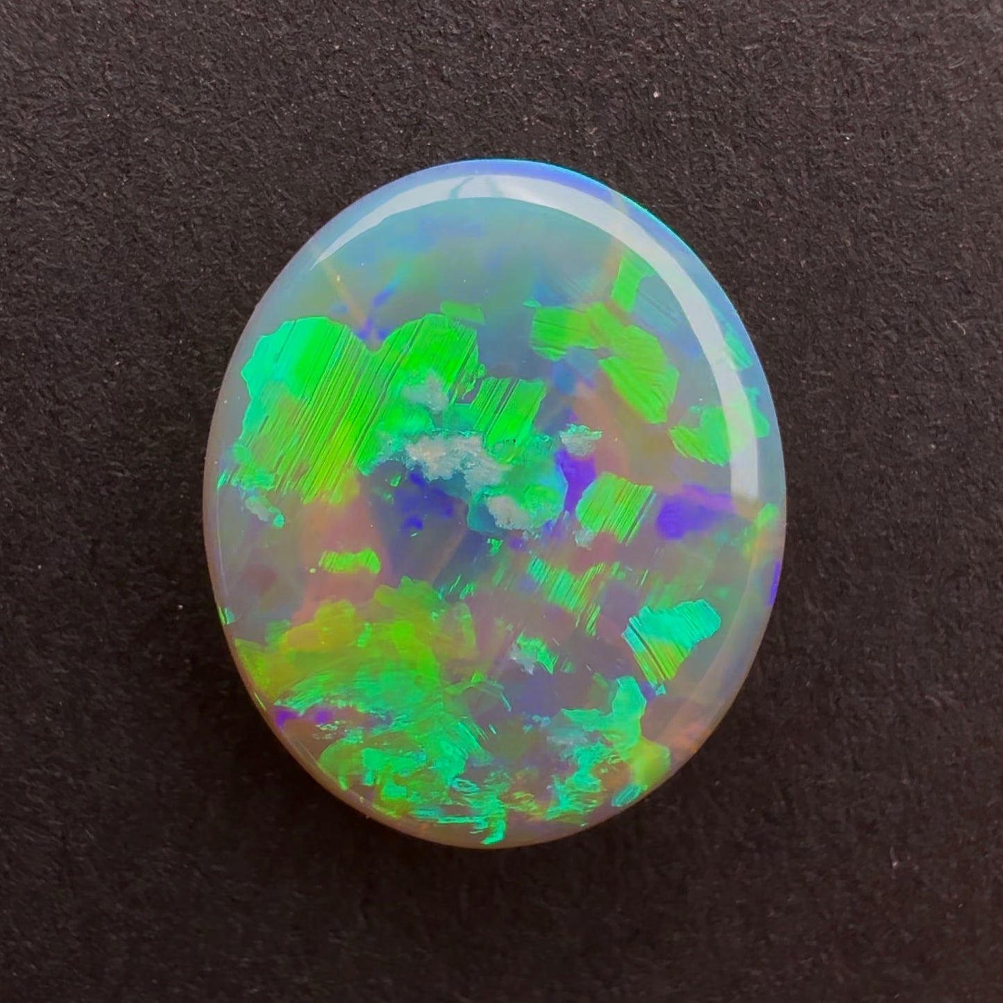 1.84cts Affordable Dark Crystal Opal With A Green Blue Play Of Color, From Lightning Ridge Australia
