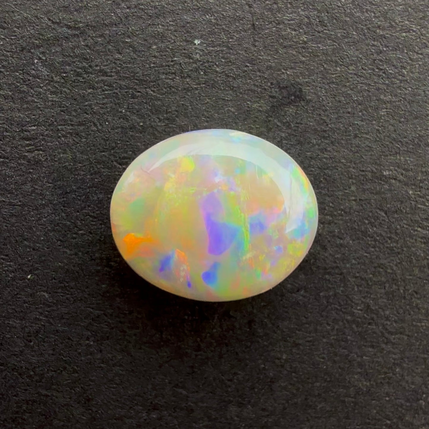 0.7cts Affordable Dark Opal With A Red Pink Multicolor Play Of Color, From Lightning Ridge Australia