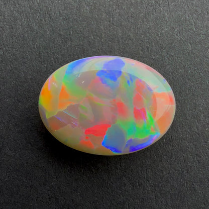 3cts Dark Opal With A Red Pink Multicolor Play Of Color, From Lightning Ridge Australia