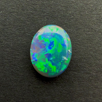0.77cts Black Opal With A Green Blue Play Of Color, From Lightning Ridge Australia