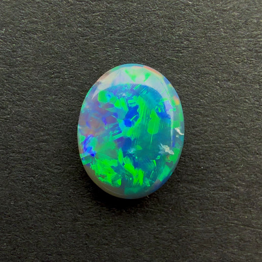0.77cts Black Opal With A Green Blue Play Of Color, From Lightning Ridge Australia