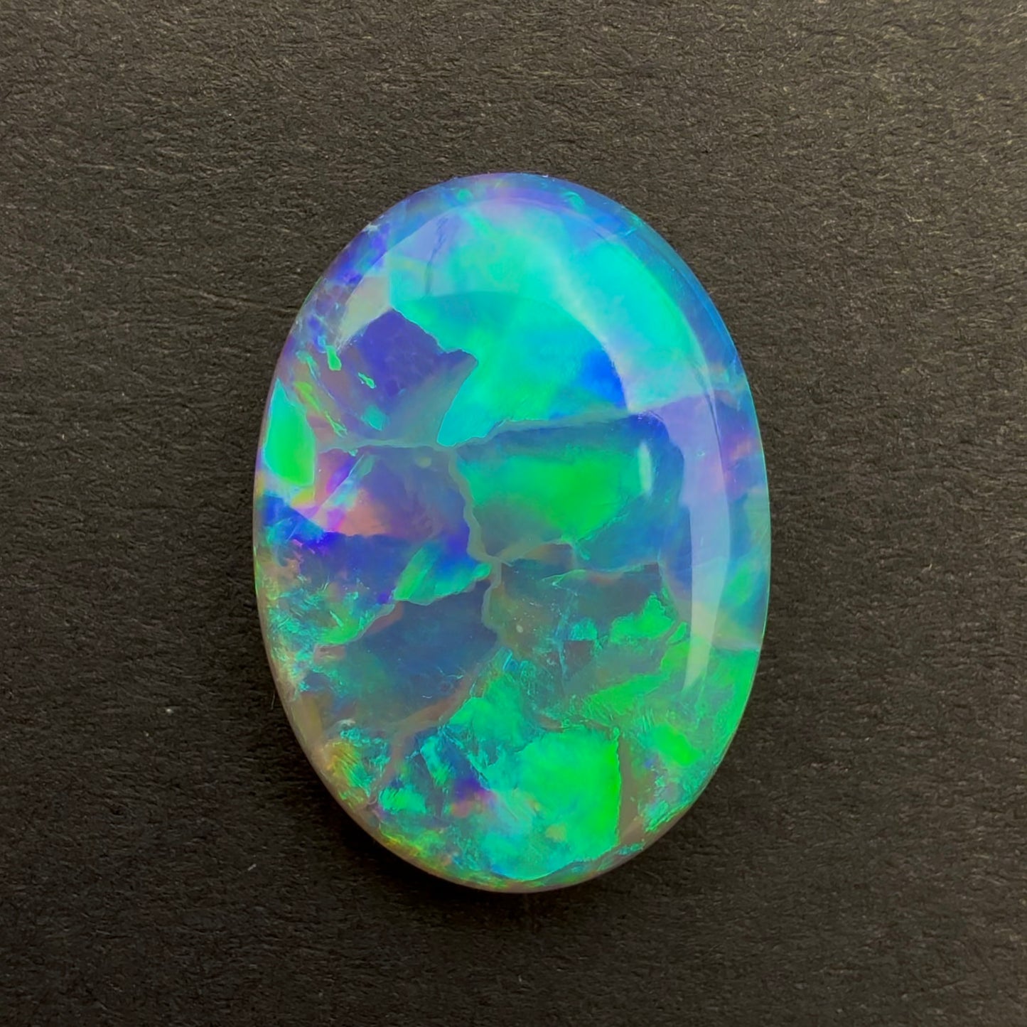 4.6cts Crystal Opal With A Green Blue Play Of Color, From Lightning Ridge Australia