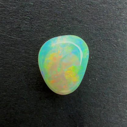 0.43cts Affordable Dark Crystal Opal With A Green, Yellow, Gold Multicolor Play Of Color, From Lightning Ridge Australia