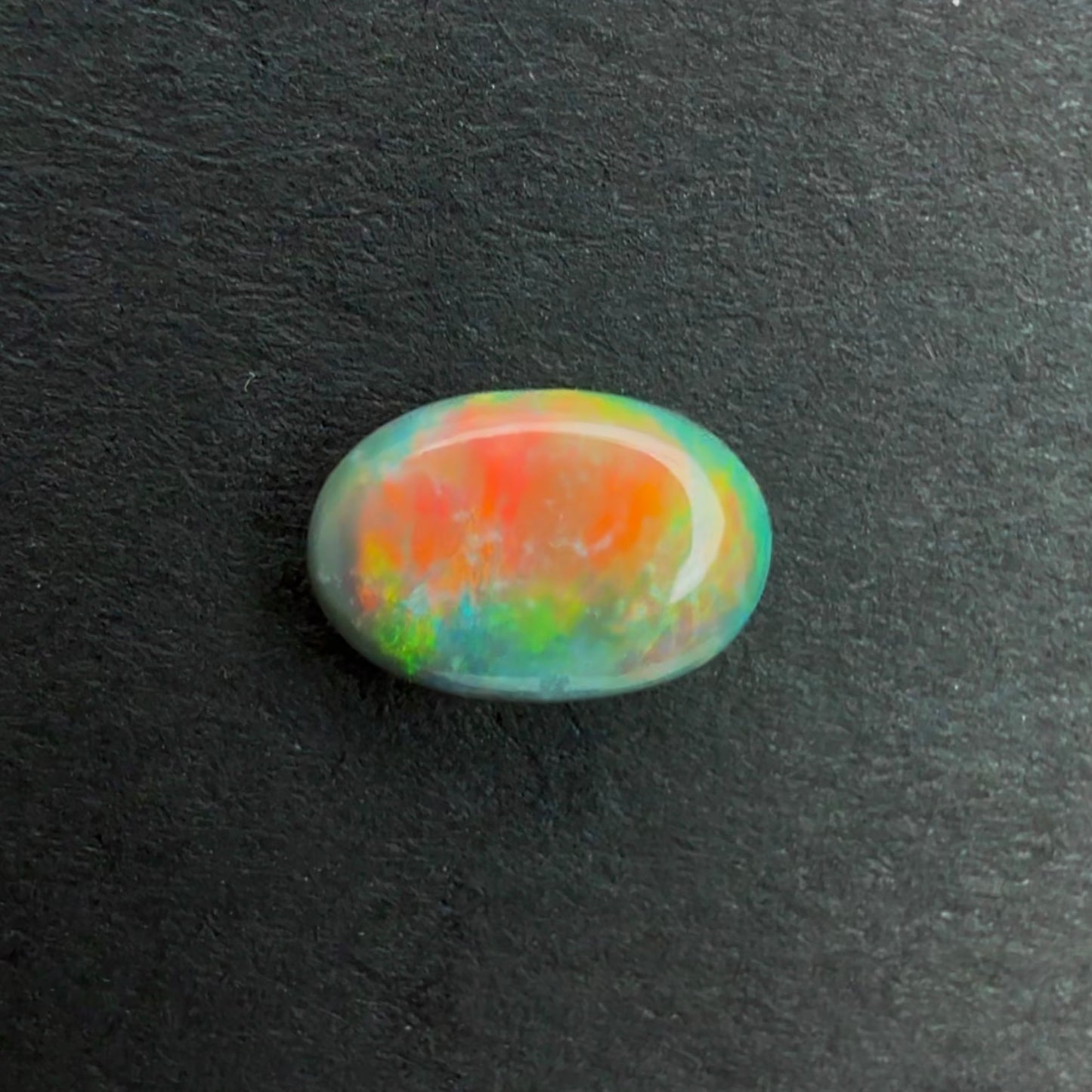 0.47cts Affordable Black Opal With A Red Pink Multicolor Play Of Color, From Lightning Ridge Australia