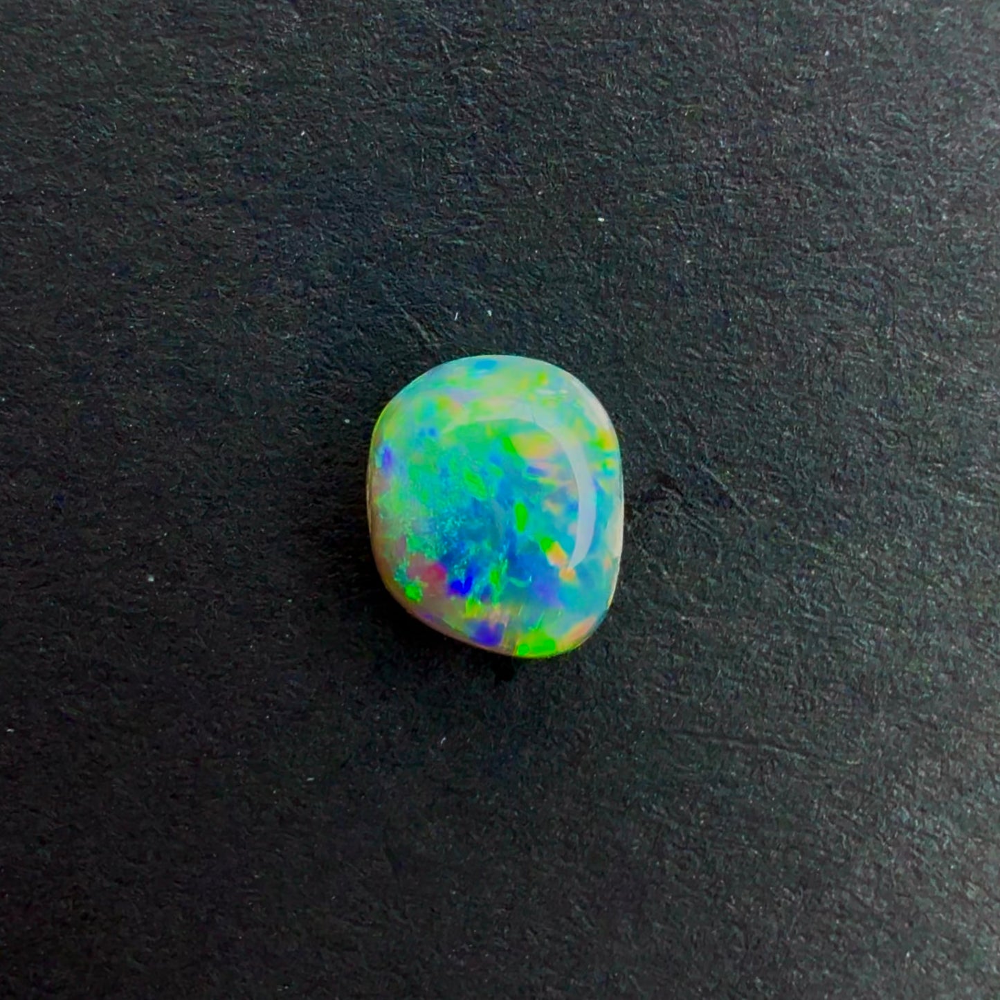 0.55cts Dark Crystal Opal With A Green Blue Multicolor Play Of Color, From Lightning Ridge Australia